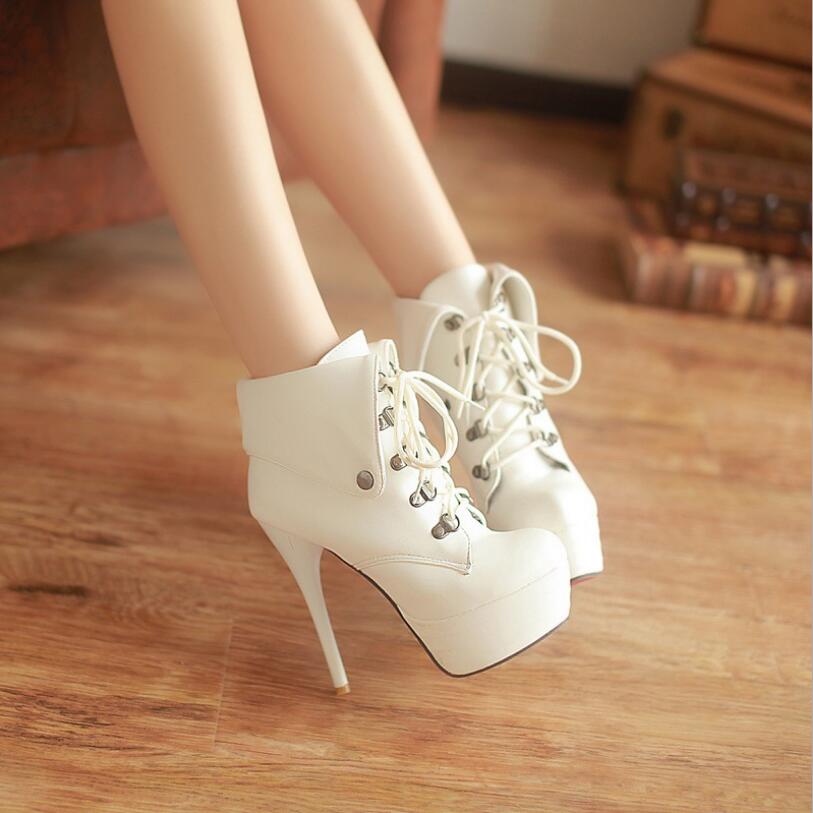 black bootie with gold heel